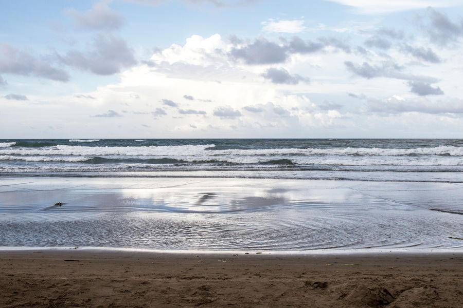 Cloudy day at the beach with no people. Touristic Tecolutla beach in Veracruz, Mexico.