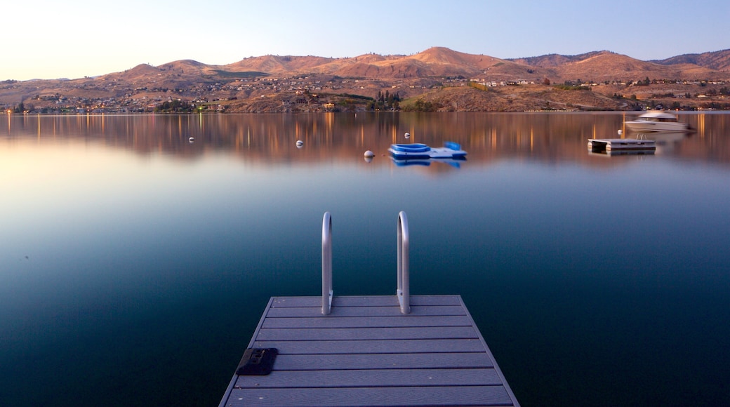 Lake Chelan which includes a sunset, boating and tranquil scenes