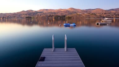 Lake Chelan featuring boating, a sunset and tranquil scenes