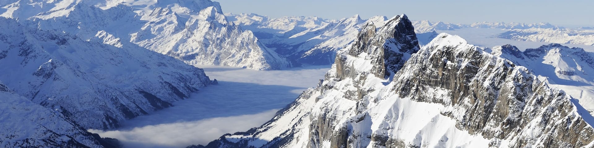 View from Titlis mountain into the Bernese Alps, with Eiger, Moench and Jungfrau mountains in the distance, Engelberg, Obwalden, Switzerland, Europe