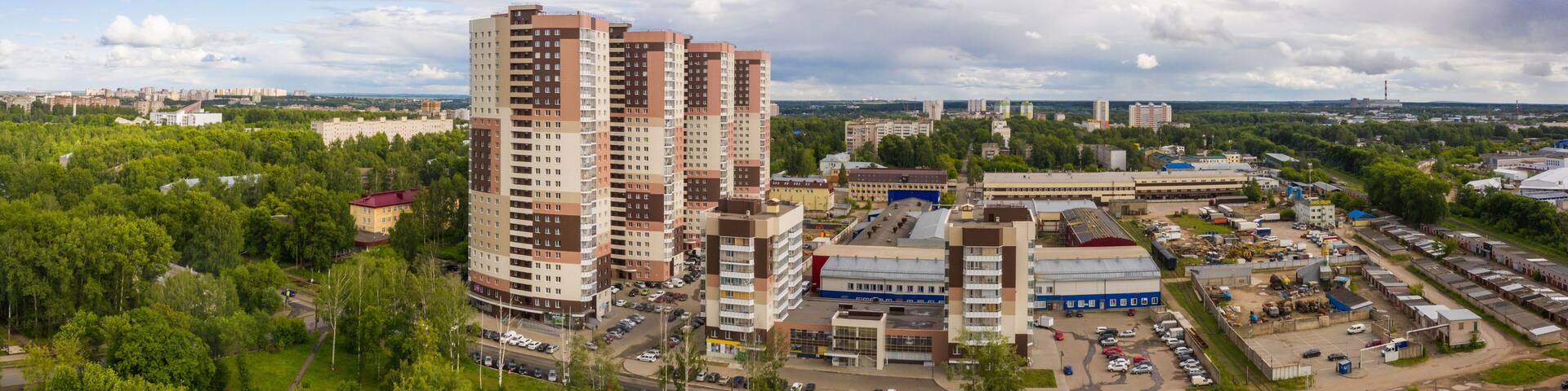Panorama of the Kirov city and Leninsky district in the central part of the city of Kirov on a summer day from above. Russia from the drone.