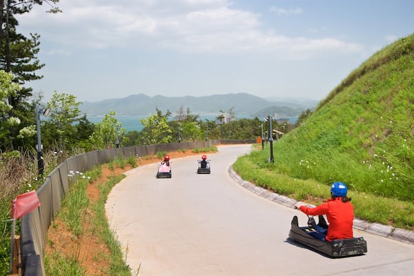 Skyline Luge Tongyeong as well as a small group of people