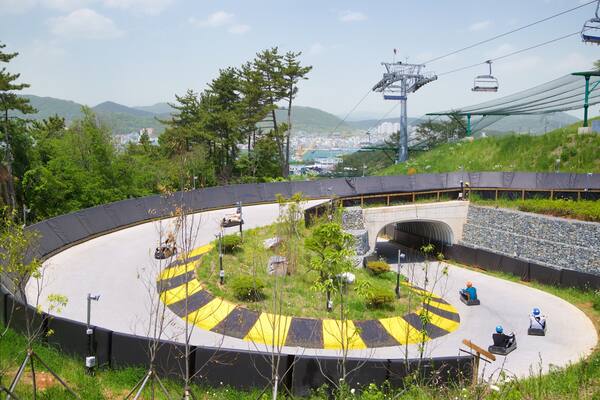 Skyline Luge Tongyeong as well as a small group of people