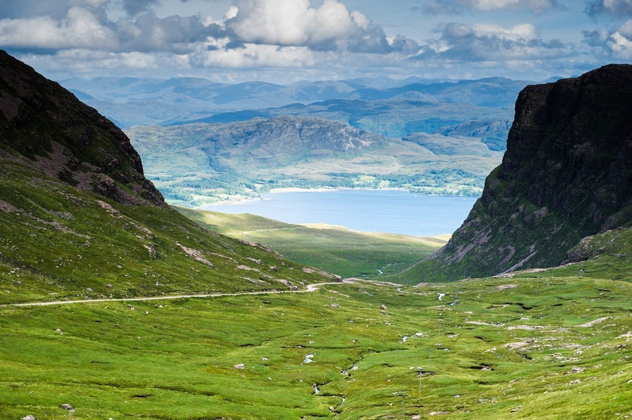 The Bealach na Ba ("Pass of the cattle") is not a single attraction, it doesn't have a visitor centre, and there are no visitor facilities as such.
But the Bealach is an unforgettable drive up and along one of the most dramatic roads on mainland UK, rivalling many a Swiss mountain pass and with terrific views across much of Wester Ross, the whole of Skye, and the Islands of Rum and the Outer Hebrides. You will NOT forget this drive as long as you live!