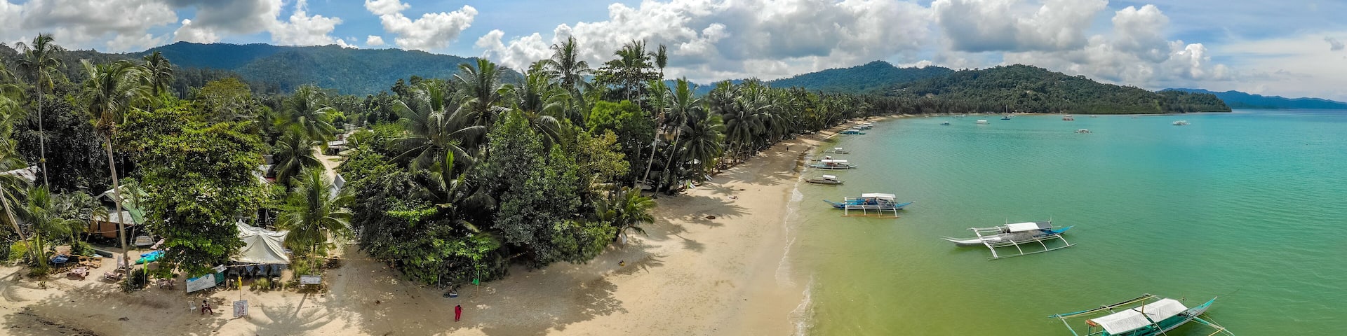 Aerial view of Port Barton Beach on paradise island, tropical travel destination - Port Barton, San Vicente, Palawan, Philippines.