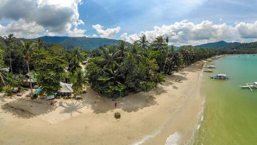 Aerial view of Port Barton Beach on paradise island, tropical travel destination - Port Barton, San Vicente, Palawan, Philippines.