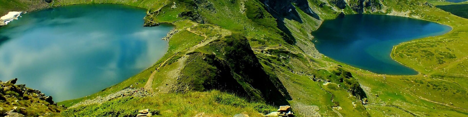 These are two of the Seven Rila Lakes. Their names are: the Eye (Окото) on the left and the Kidney on the right (Бъбрека)