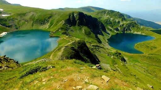 These are two of the Seven Rila Lakes. Their names are: the Eye (Окото) on the left and the Kidney on the right (Бъбрека)