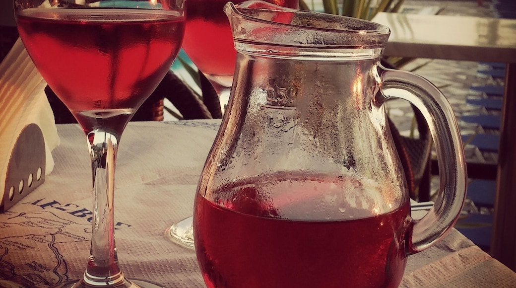 Enjoying the local rose by the pool.