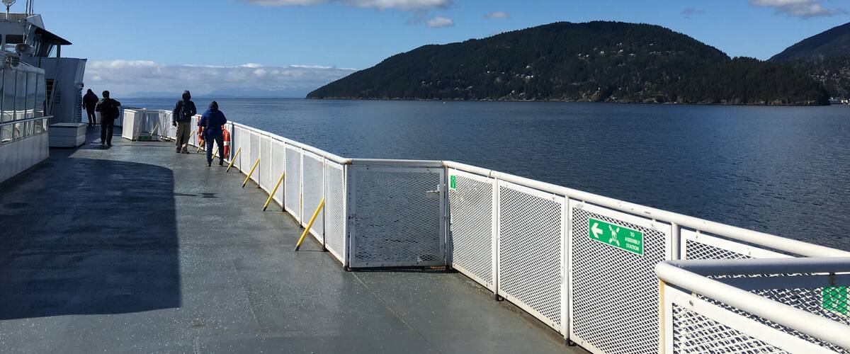 Horseshoe Bay, British Columbia, Canada -- April 11, 2021: BC Ferries vessel departing from Horseshoe Bay Terminal on its way to Vancouver Island.
