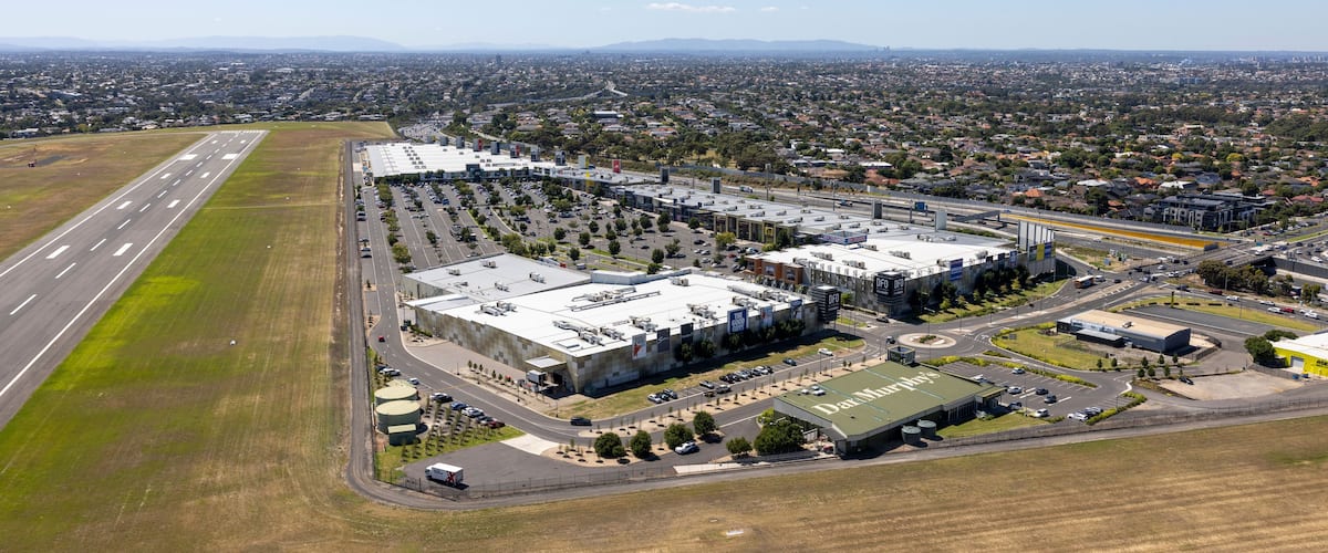 Aerial view of essendon fields airport with modern buildings and expansive runway, melbourne, victoria, australia.