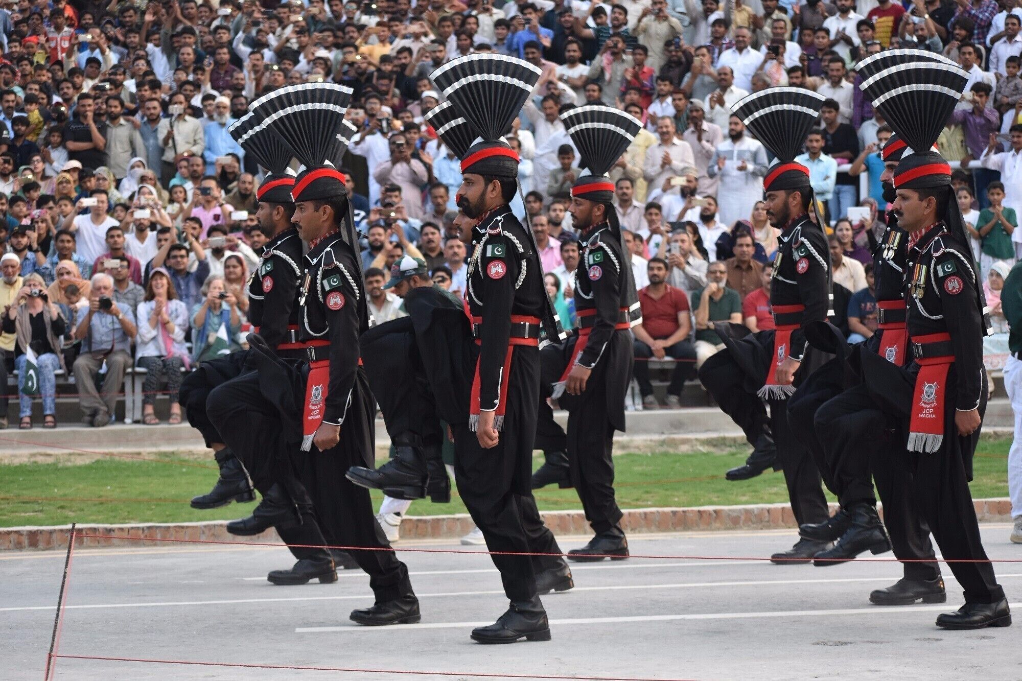 The Wagah border ceremony and retreat is unlike anything I have seen. Pakistanis sit on one side and Indians on the other. We were surrounded by cheering and loud Pakistani patriotic music. Here are my ceremony photos.Check out the high kicks.