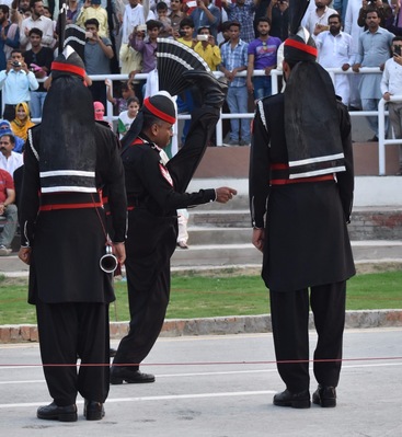 The Wagah border ceremony and retreat is unlike anything I have seen. Pakistanis sit on one side and Indians on the other. We were surrounded by cheering and loud Pakistani patriotic music. Here are my ceremony photos.Check out the high kicks.