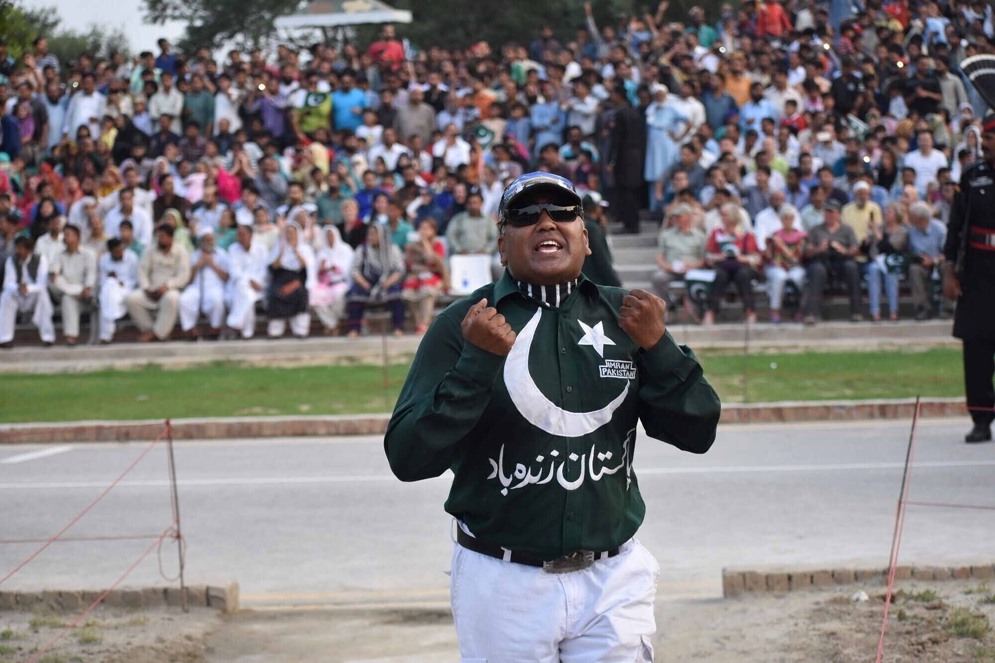The Wagah border ceremony and retreat is unlike anything I have seen. Pakistanis sit on one side and Indians on the other. We were surrounded by cheering and loud Pakistani patriotic music. Here are my ceremony photos. Yes, we had a cheerleader.
