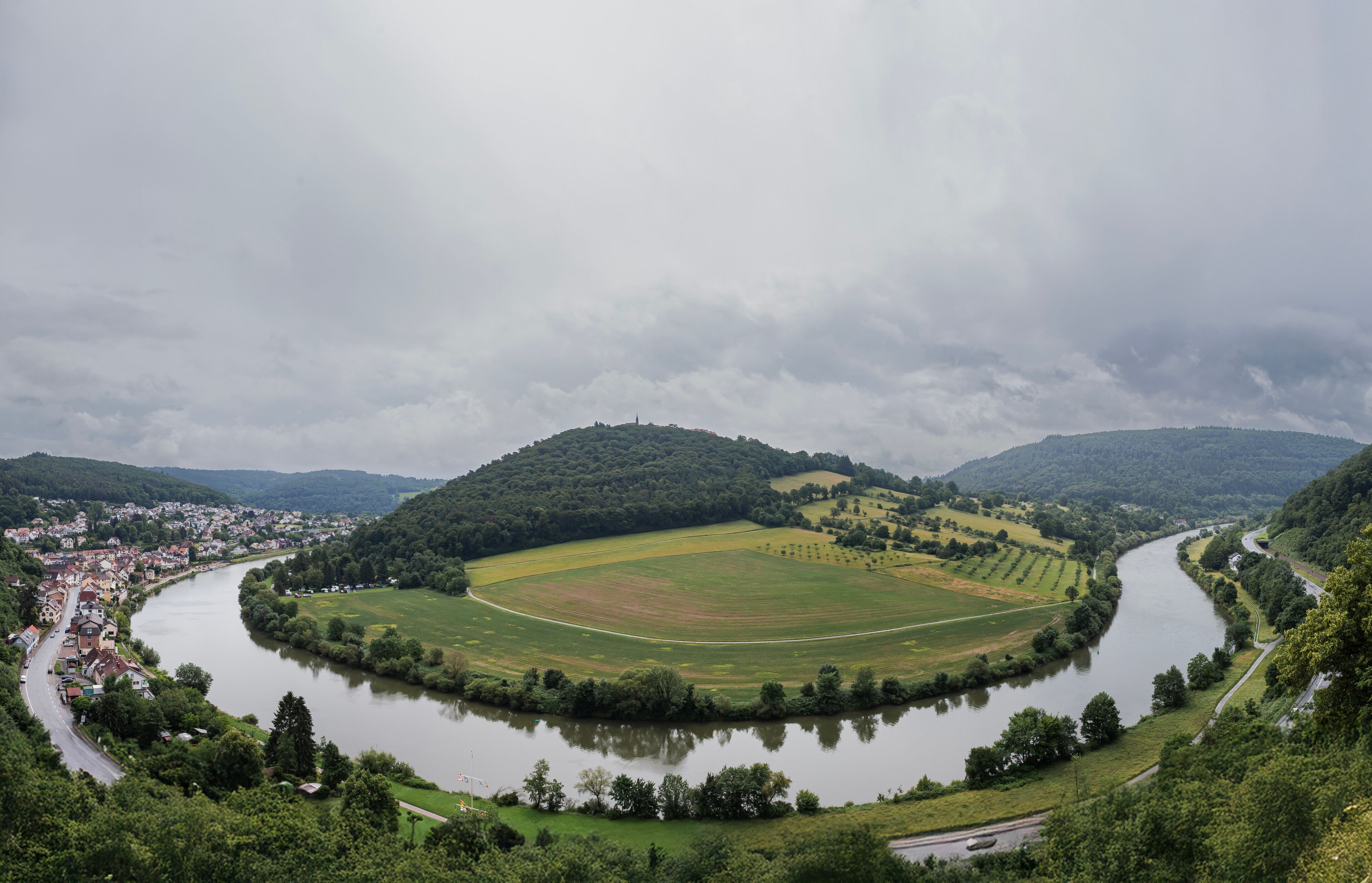 Dramatic Clouds Over the Neckar River in Neckarsteinach, Germany