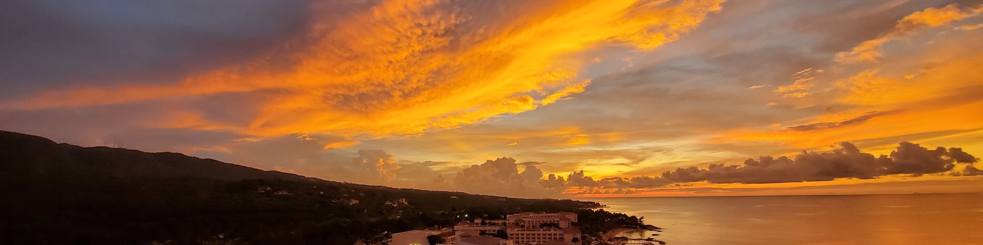"Red sky at night..." take time to soak in the unreal sunsets in MoBay #sunsets #jamaica #familytravel