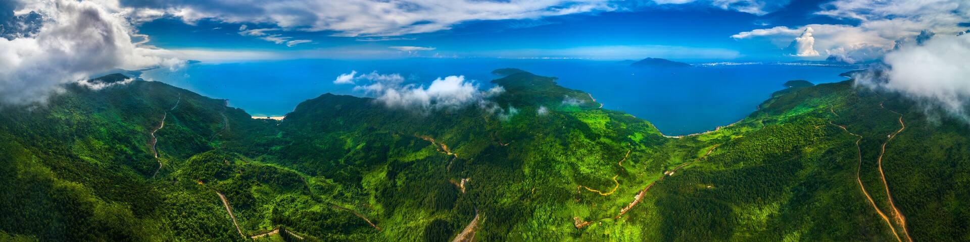 Aerial view of Lang Co bay and Da Nang bay, Hai Van pass, Bach Ma mountain, Hue, Vietnam. Panorama