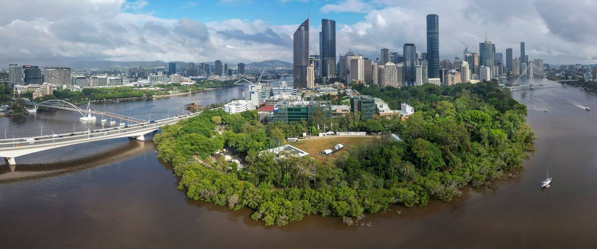 Aerial view of Brisbane City with the Brisbane River, City Botanic Gardens, and modern skyscrapers, Brisbane, Australia.
