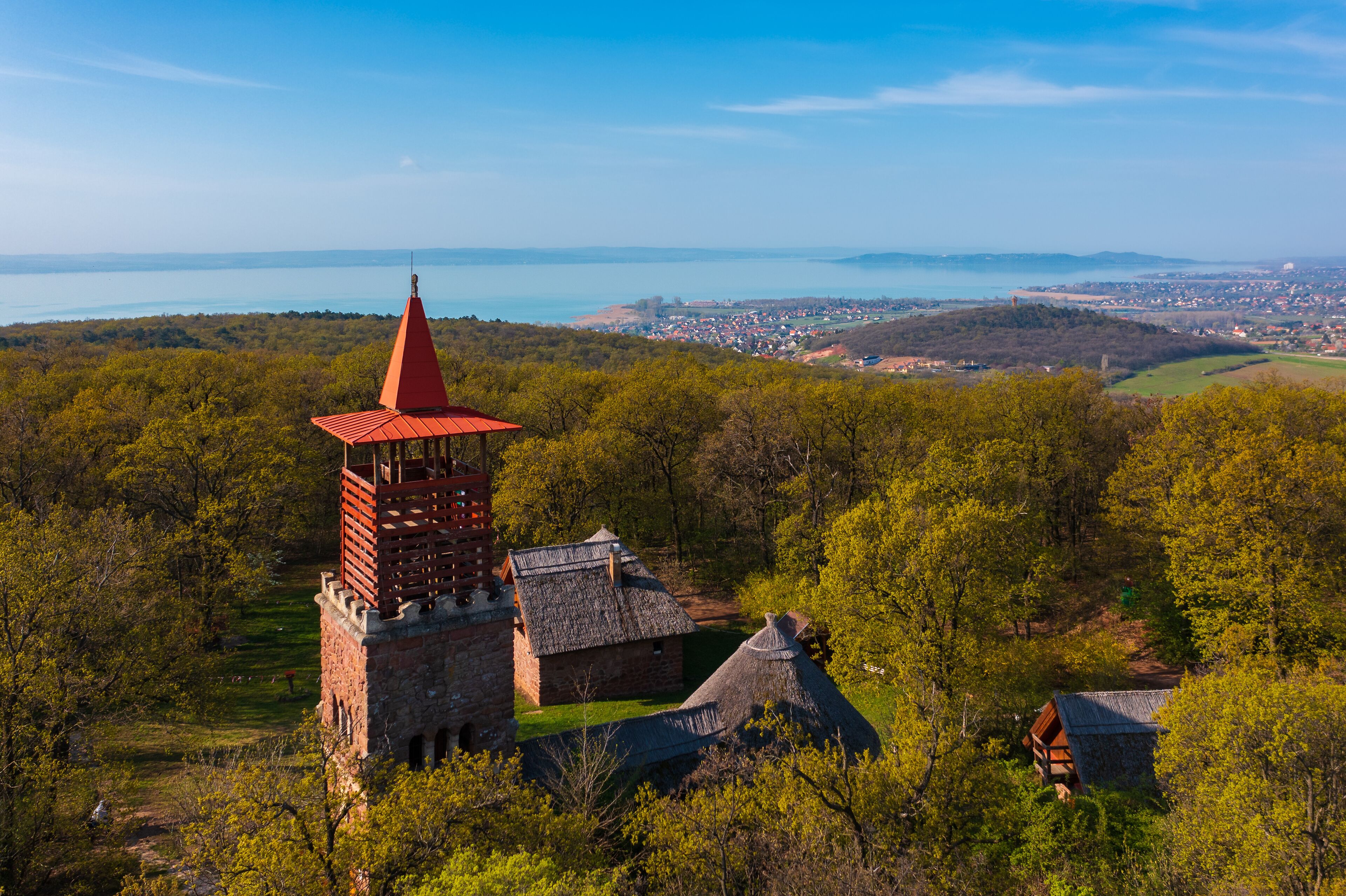 Alsóörs, Hungary - Aerial view about lookout tower on Csere mountain, with lake Balaton at the background. Spring landscape. Hungarian name is Csere-hegyi kilátó.