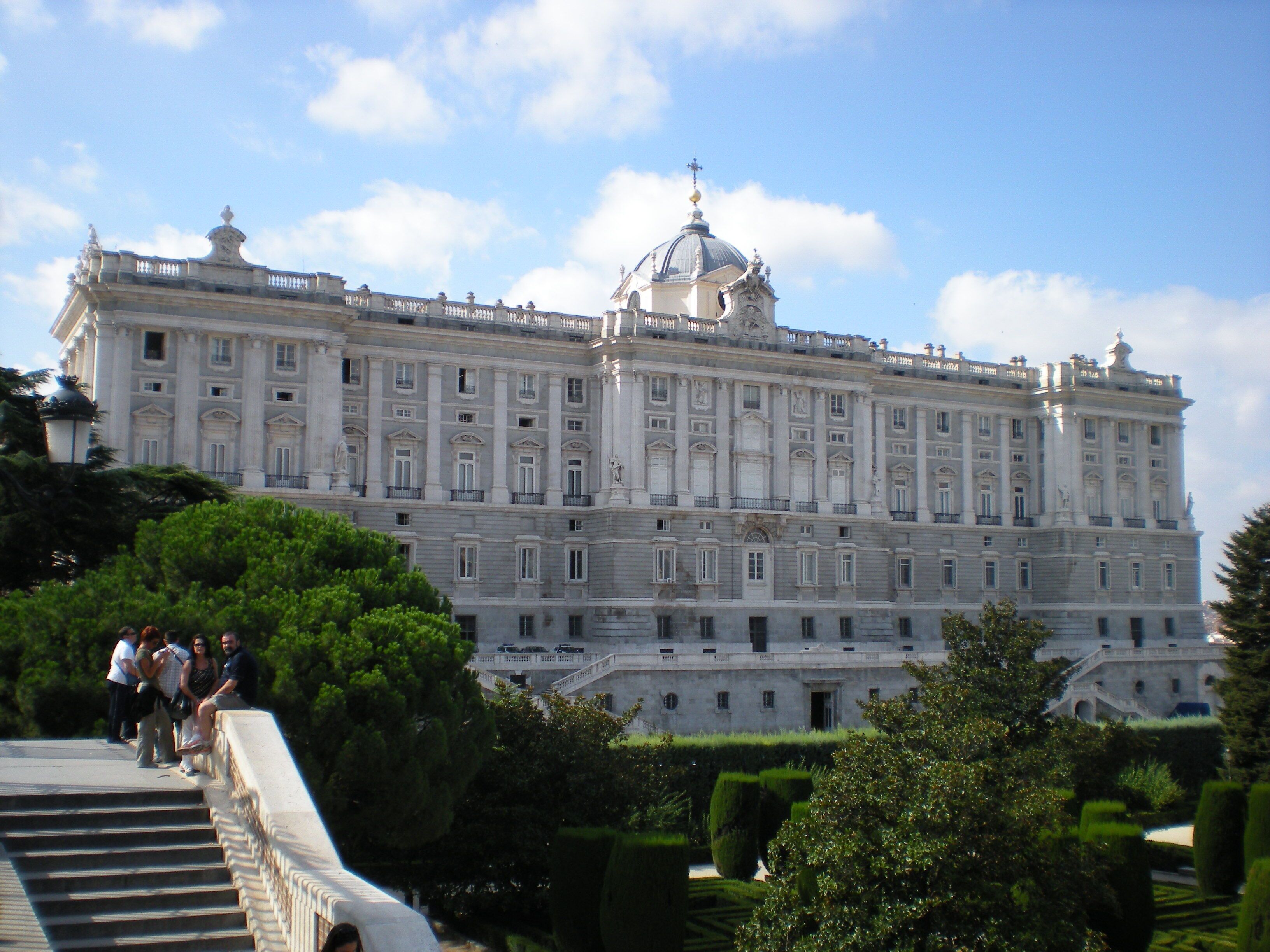 A grand historic building with a large dome and multiple windows.