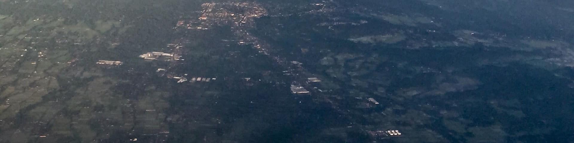 Arriving into the city of Jogyakarta around sunrise witnessing over 10 volcanoes in the area!
Source: Wikipedia
Yogyakarta (/ˌjɒɡjəˈkɑrtə/ or /ˌjoʊɡjəˈkɑrtə/; also Jogja, Jogjakarta) a city and the capital of Yogyakarta Special Region in Java, Indonesia. It is renowned as a center of education (Kota Pelajar), classical Javanese fine art and culture such as batik, ballet, drama, music, poetry, and puppet shows. Yogyakarta was the Indonesian capital during the Indonesian National Revolution from 1945 to 1949. One of the districts in Yogyakarta, Kotagede, was the capital of the Mataram Sultanate between 1575 and 1640. The city is named after the Indian city of Ayodhya from the Ramayana epic. Yogya means "suitable, fit, proper", and karta, "prosperous, flourishing" (i.e., "a city that is fit to prosper").
The Dutch name of the city is Djokjakarta.
#goldenhour