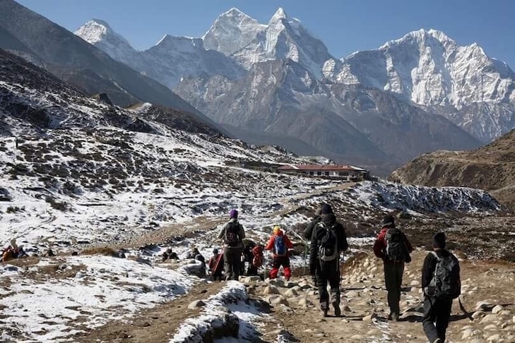 Pushing through the last few hundred meters before reaching shelter for the night. #enroutetoeverestbasecamp