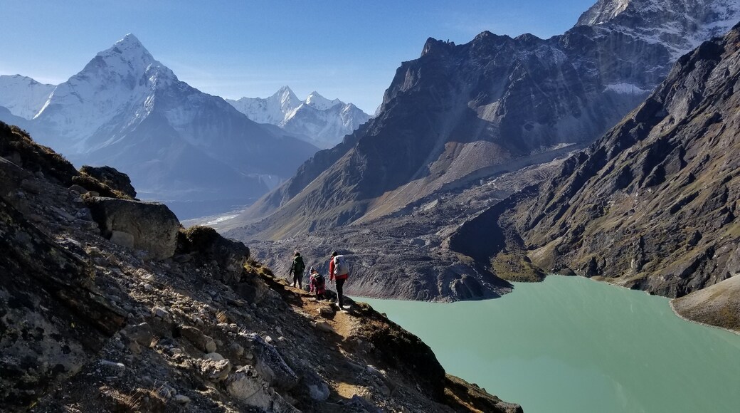 A landscape of glacial lakes and looming peaks, this day was part of a two week, unguided trek in the Gokyo Lakes and Everest region. A journey of reverence and a gratefulness for my being among it all. Our days were waking for first light on snow-capped mountains, crossing bridges, prayer flags whipping, over rushing glacial waters, passing trains of yak through dense evergreen forest, and reflecting over ginger tea.
I remember in this moment I had fallen behind my companions. I needed an extra moment of graciousness; for the blue skies that break on the soul in waves, for the mountain's echo and the exhalation of forest, and for the immensity of silence, sonorous and complete.
#Adventure #AdventureContest #Nepal #GokyoLakes #EverestBaseCamp #EBCTrek #Lukla #Kathmandu #HikeNepal #ExploreTheEarth #Backpacking #Trekking #GapYear #Travel