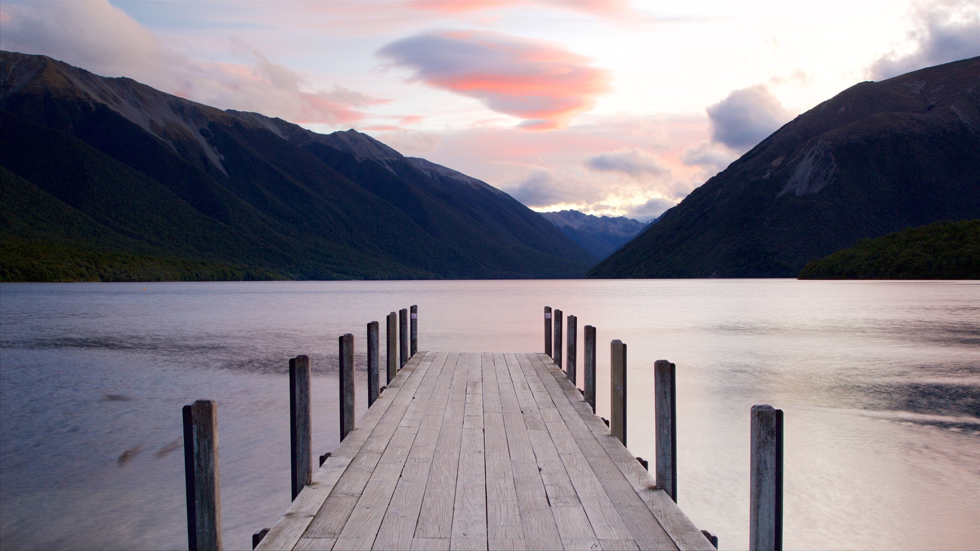 Tasman Region showing a sunset and a lake or waterhole