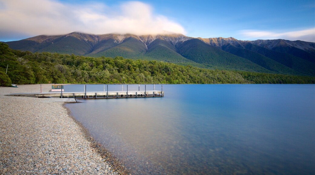 Tasman Region which includes a lake or waterhole and a pebble beach