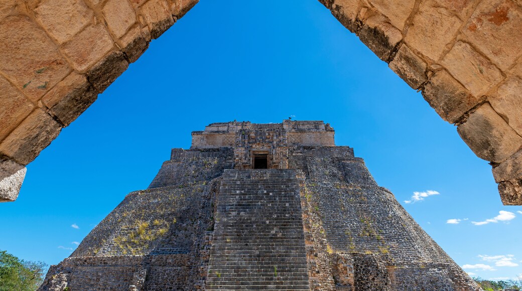 A pyramid structure with a clear blue sky in the background.