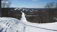 Skiing at Indianhead Mountain, MI looking towards Blackjack. Lots of snow...and you can ski both places.