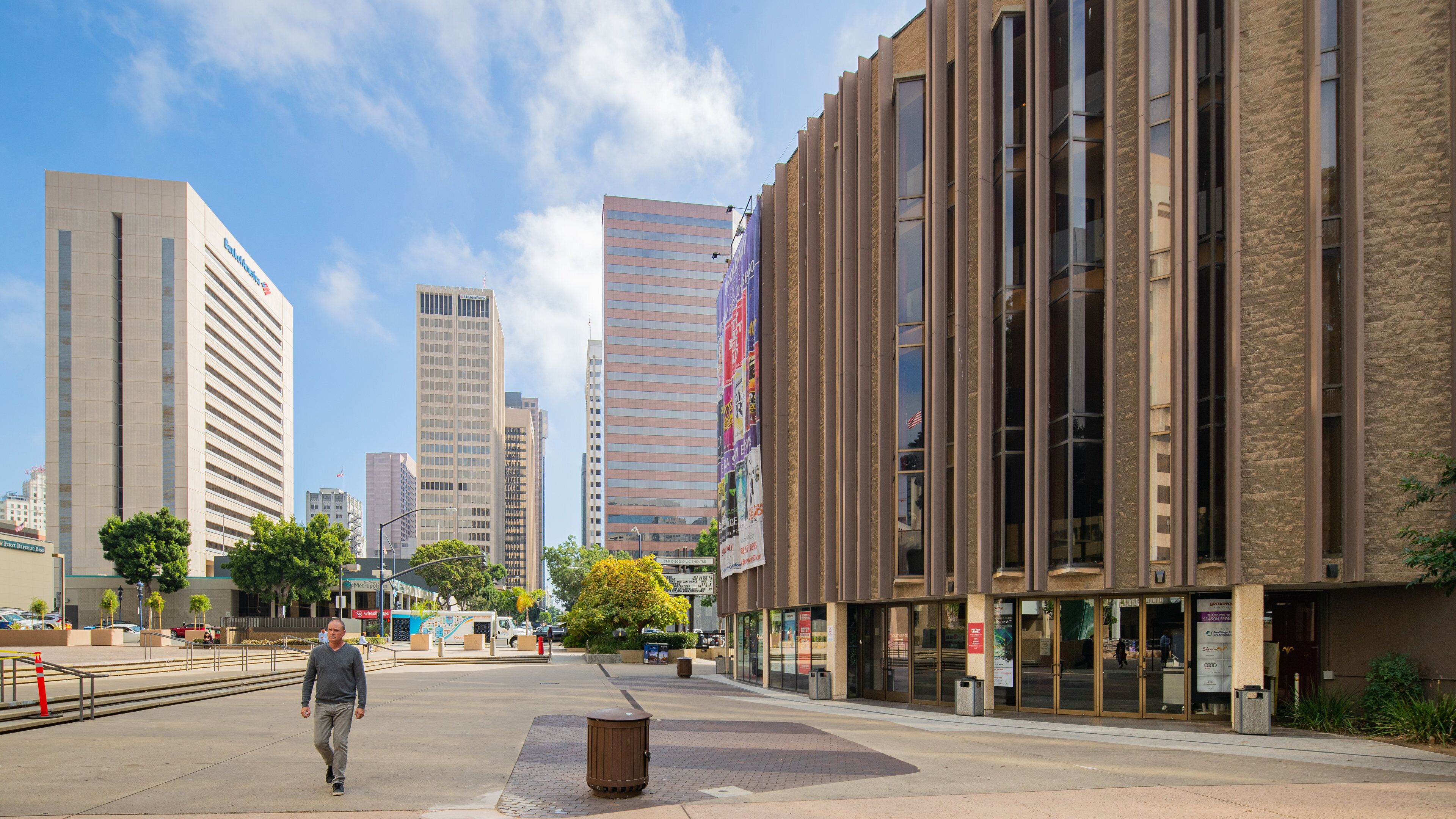 Civic Core featuring street scenes and a city as well as an individual male