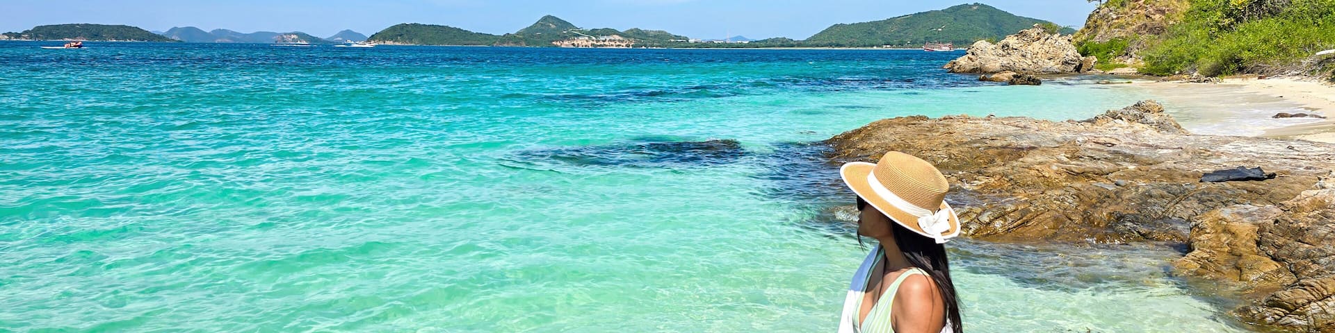Relaxing by the tranquil shores of Samae San Island in Thailand on a sunny day