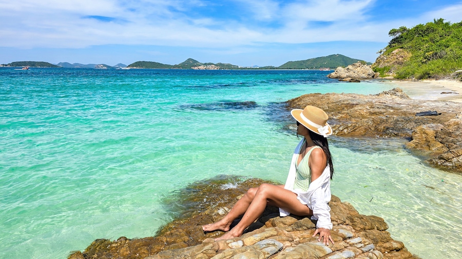 Relaxing by the tranquil shores of Samae San Island in Thailand on a sunny day