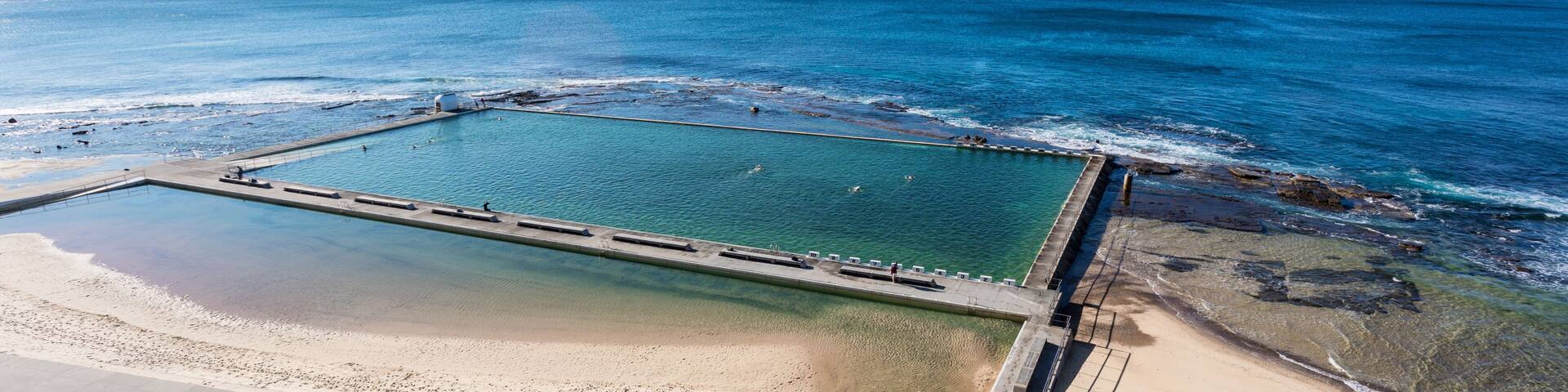 Merewether Ocean Baths in Newcastle is one of the largest ocean pool in Australia and a recognisable landmark in the coastal city.