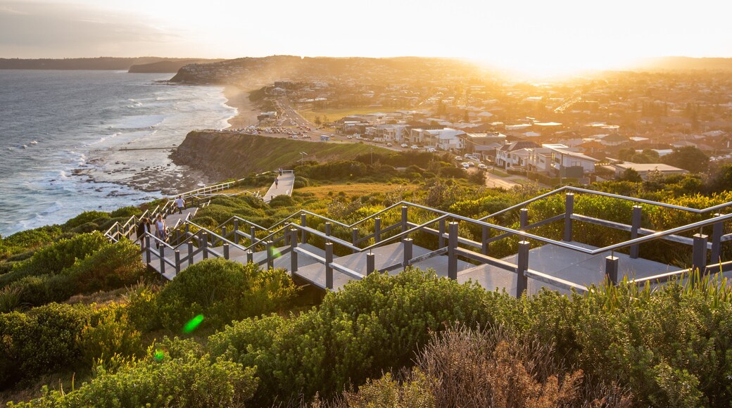 ANZAC Memorial Bridge which includes a sunset, general coastal views and landscape views
