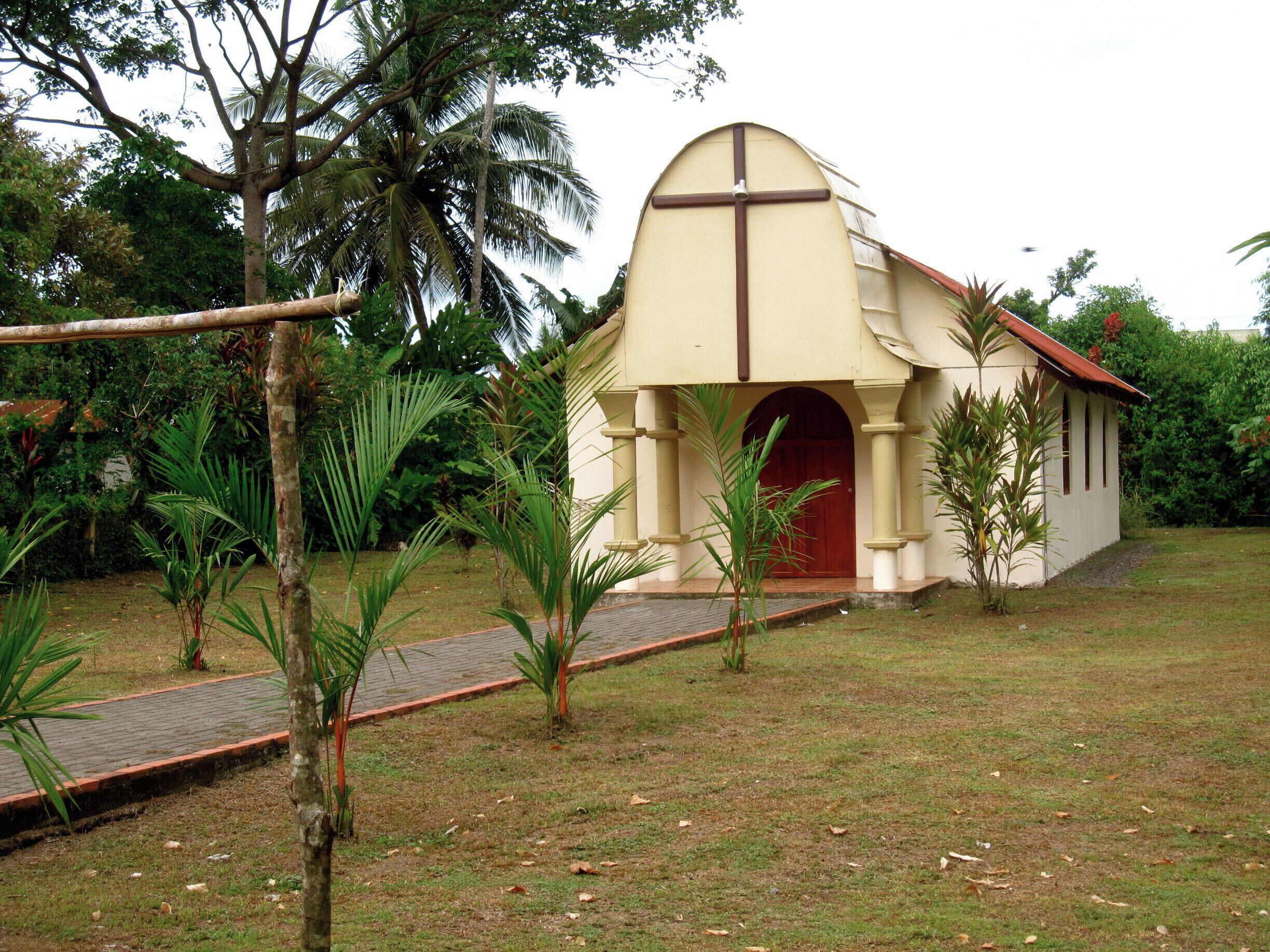 This is the Iglesia of Tortuguero, along the main street in town where you can also find everything else you need.
This town has no cars and is accessible by boat. 
And it has a cozy beach where you can watch baby turtles be born by moonlight. Truly an amazing Costa Rican adventure.