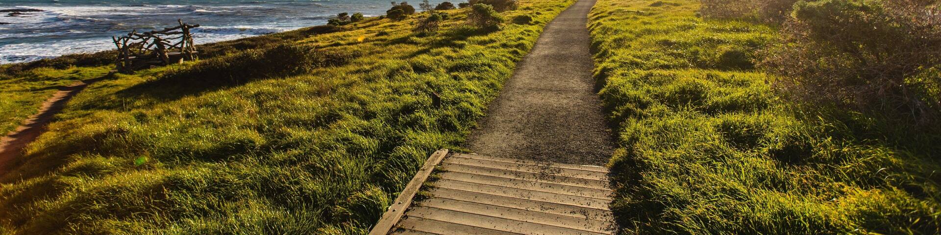 Fiscalini Ranch Preserve which includes general coastal views, tranquil scenes and a sunset