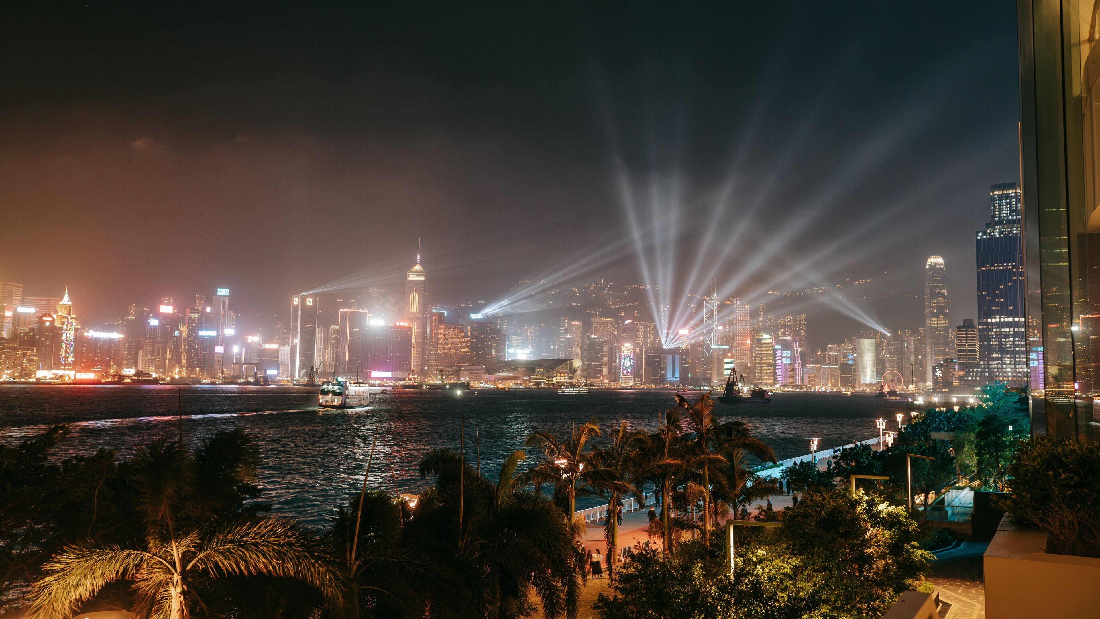 Hung Hom Promenade which includes a bay or harbor, landscape views and night scenes