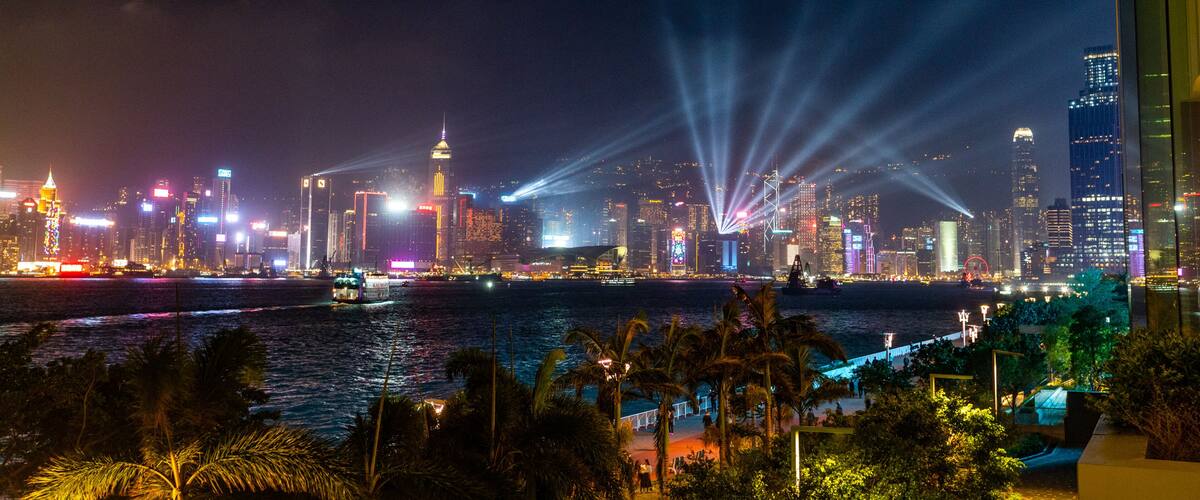 Hung Hom Promenade which includes a bay or harbor, a city and night scenes