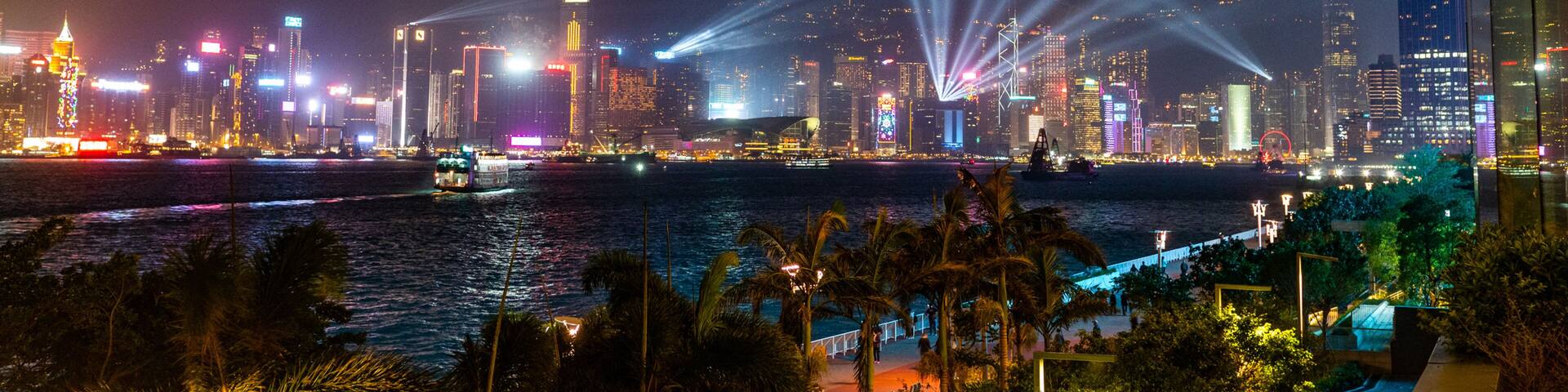 Hung Hom Promenade which includes a bay or harbor, a city and night scenes
