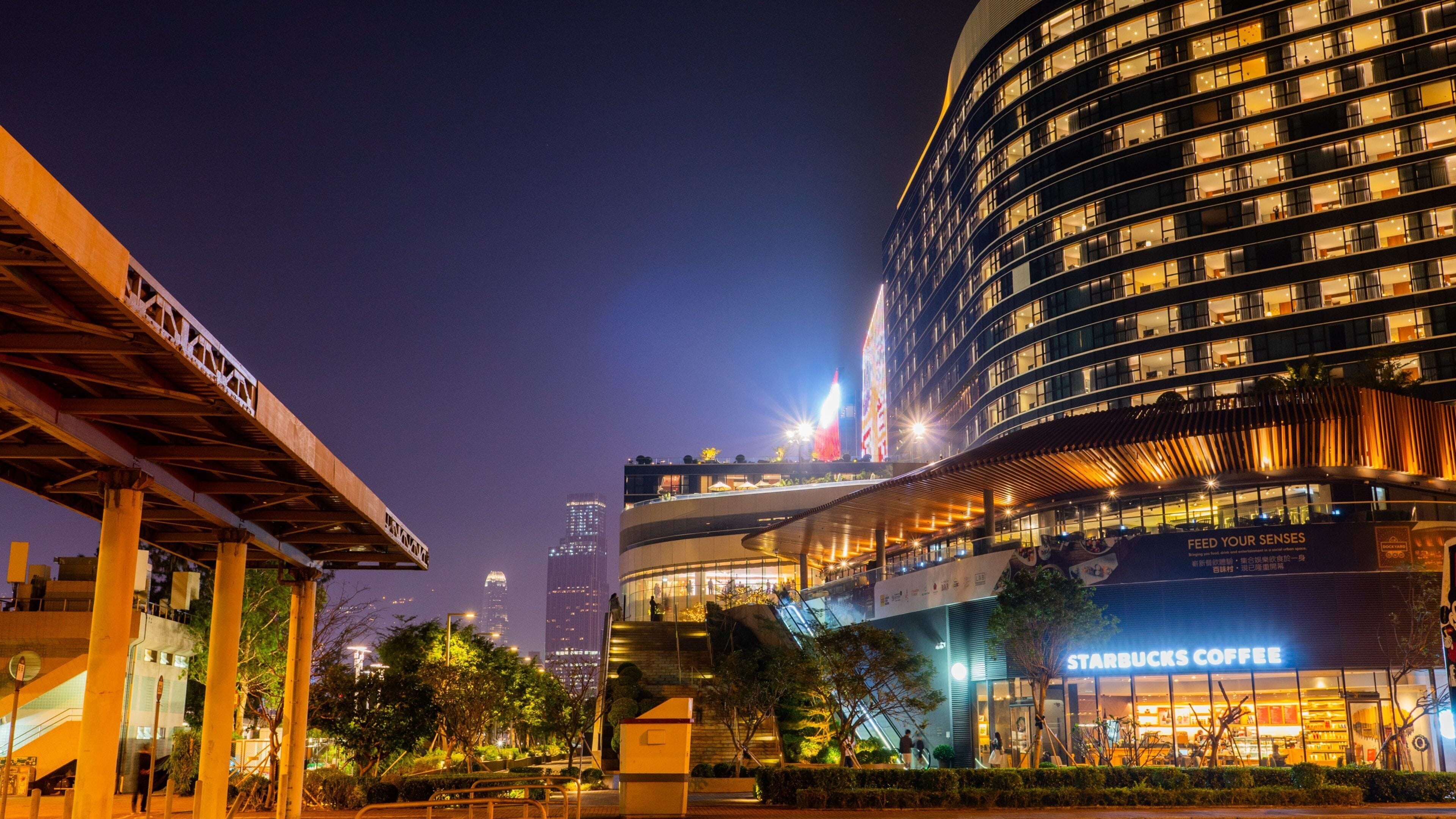Hung Hom Promenade showing night scenes and a city