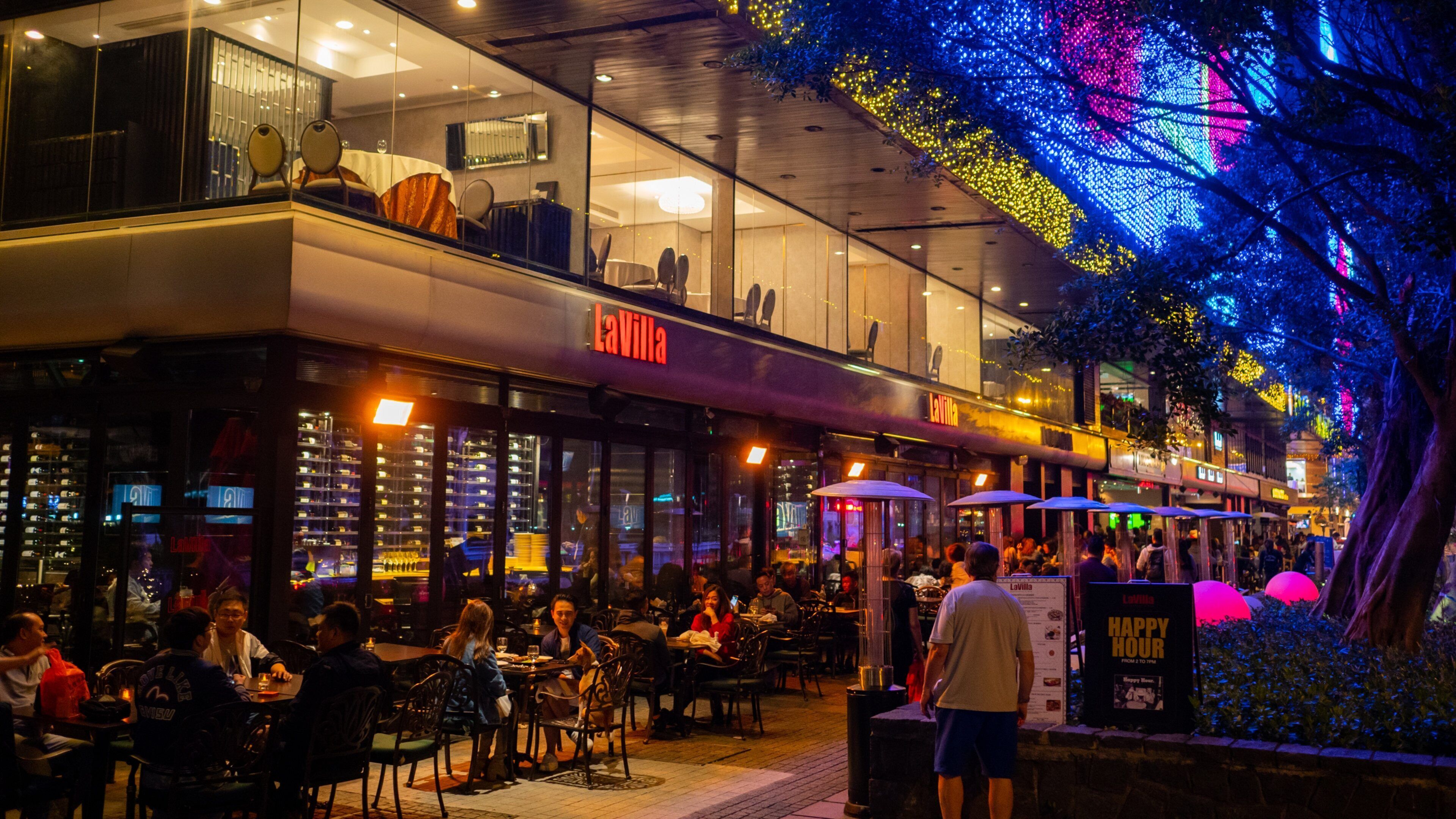 Hung Hom Promenade showing street scenes, night scenes and outdoor eating