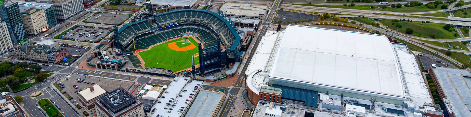 Comerica Park and Little Caesars Arena in Detroit. Drone aerial photo of Comerica Park baseball stadium and Little Caesars Arena in downtown Detroit, Michigan.