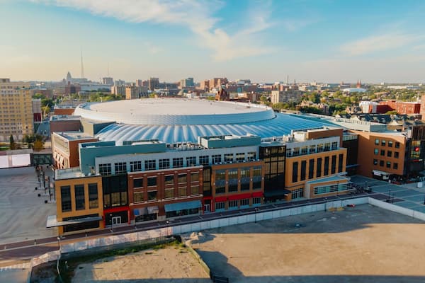 Aerial view of Little Caesars Arena, Detroit, with surrounding city buildings. Construction site visible. LITTLE CAESARS ARENA, DETROIT, MICHIGAN, UNITED STATES