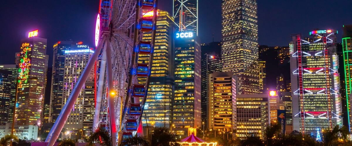 The Hong Kong Observation Wheel featuring a city and night scenes