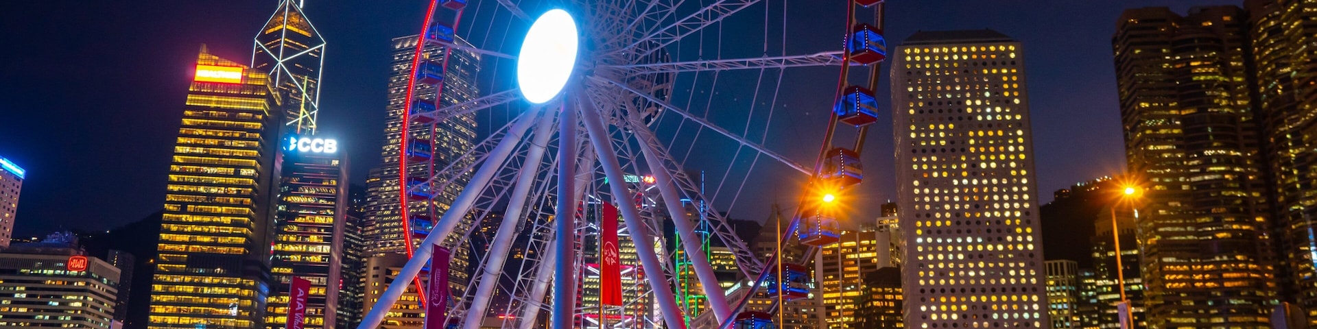 The Hong Kong Observation Wheel which includes night scenes, street scenes and a city