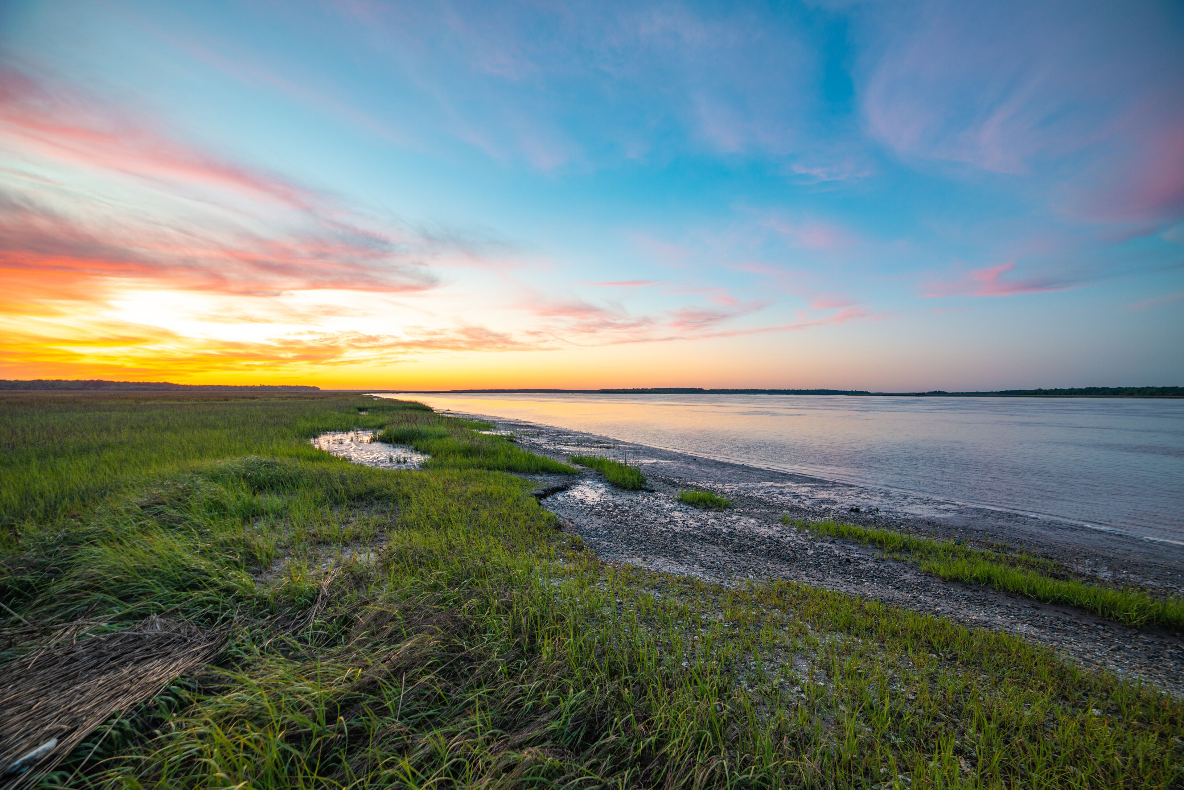 Sunset by the broad river