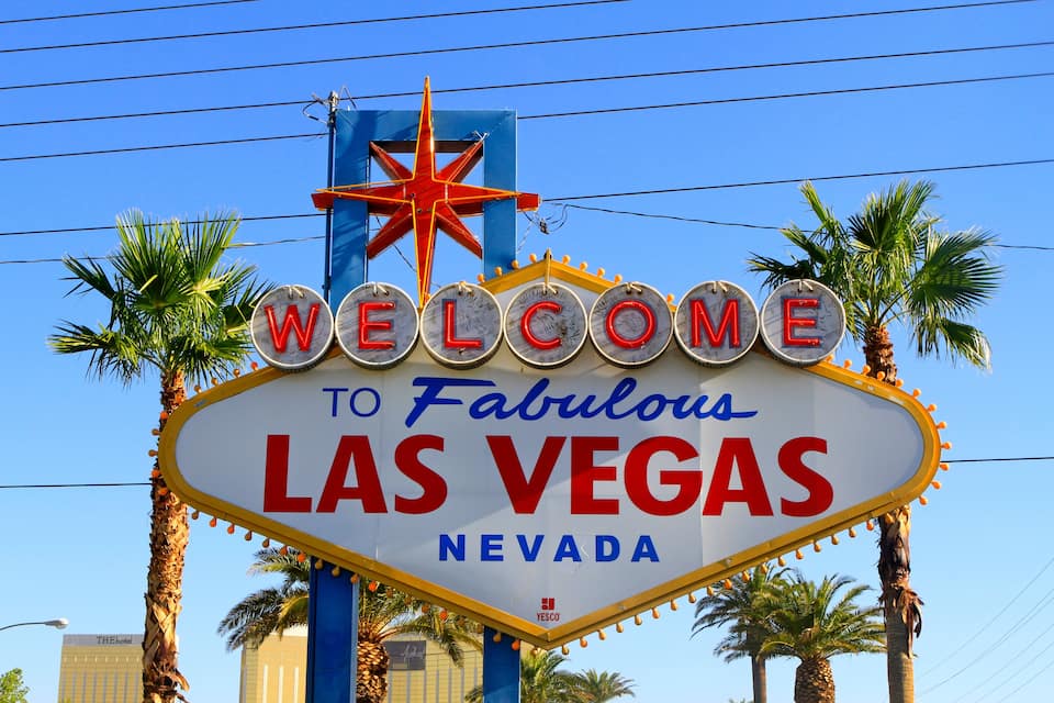A sign with the words 'WELCOME TO Fabulous LAS VEGAS' and a star above it.