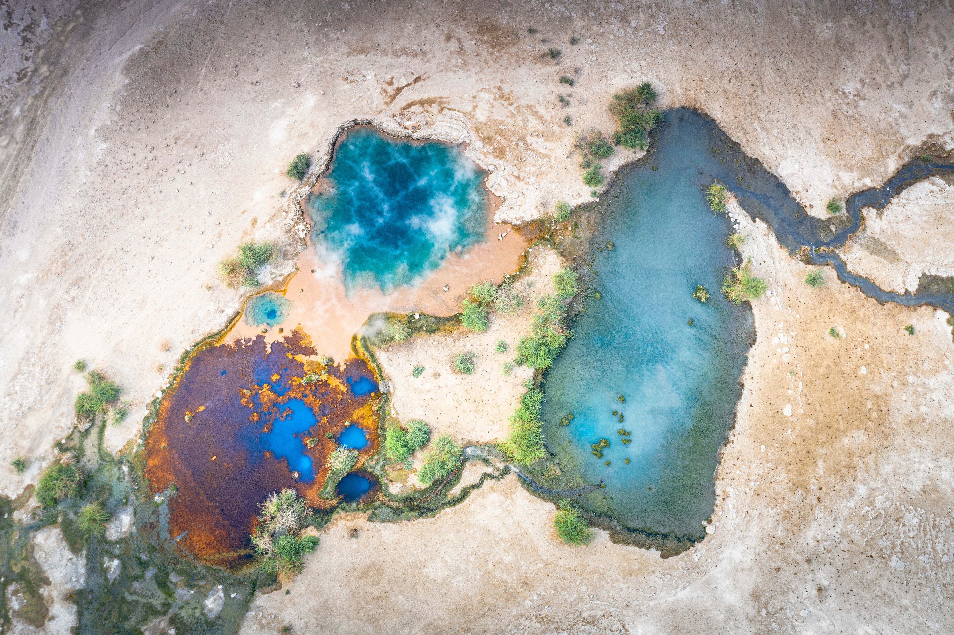 Aerial view by drone of steam of Ala Lobet (Alol Bet) geyser from above, Semera, Afar Region, Ethiopia